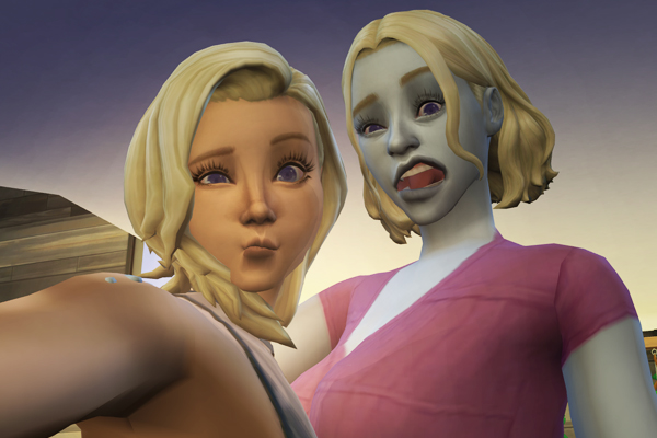 a selfie of two sims making silly faces